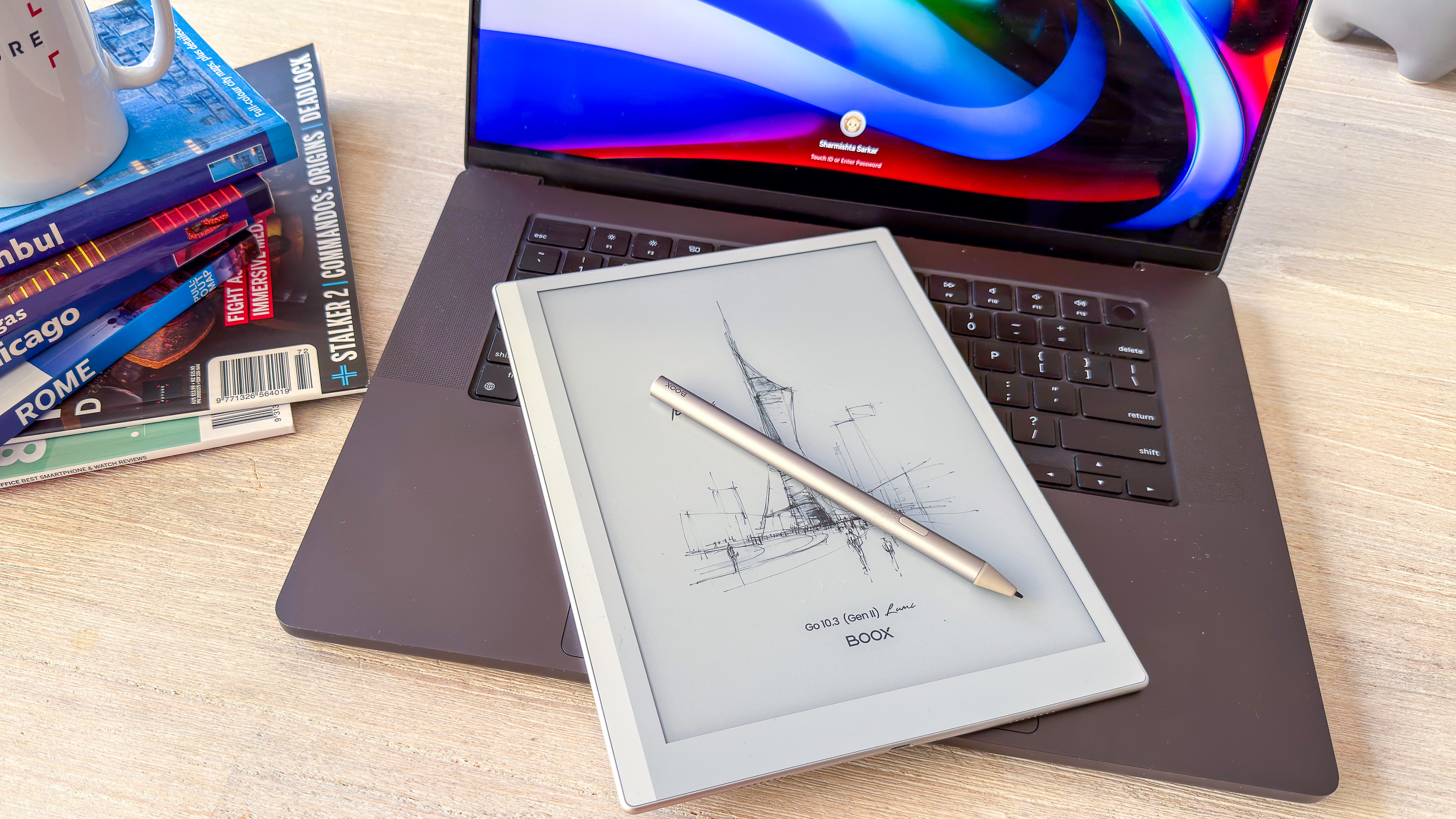Boox Go 10.3 (Gen II) Lumi and its InkSense Plus stylus lying on a laptop