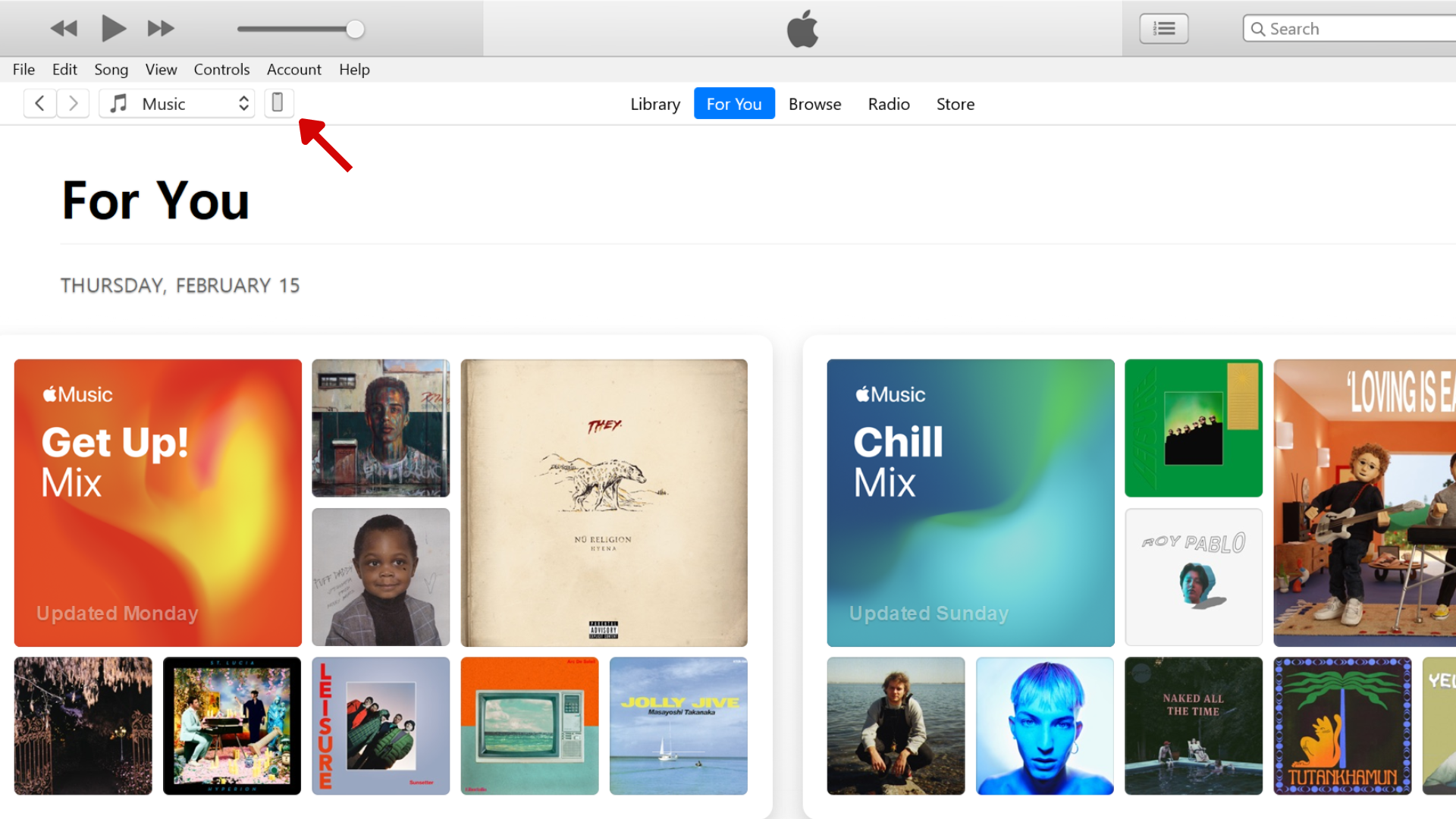 A screenshot of the iTunes app on Windows, with a red arrow pointing at the phone icon. 