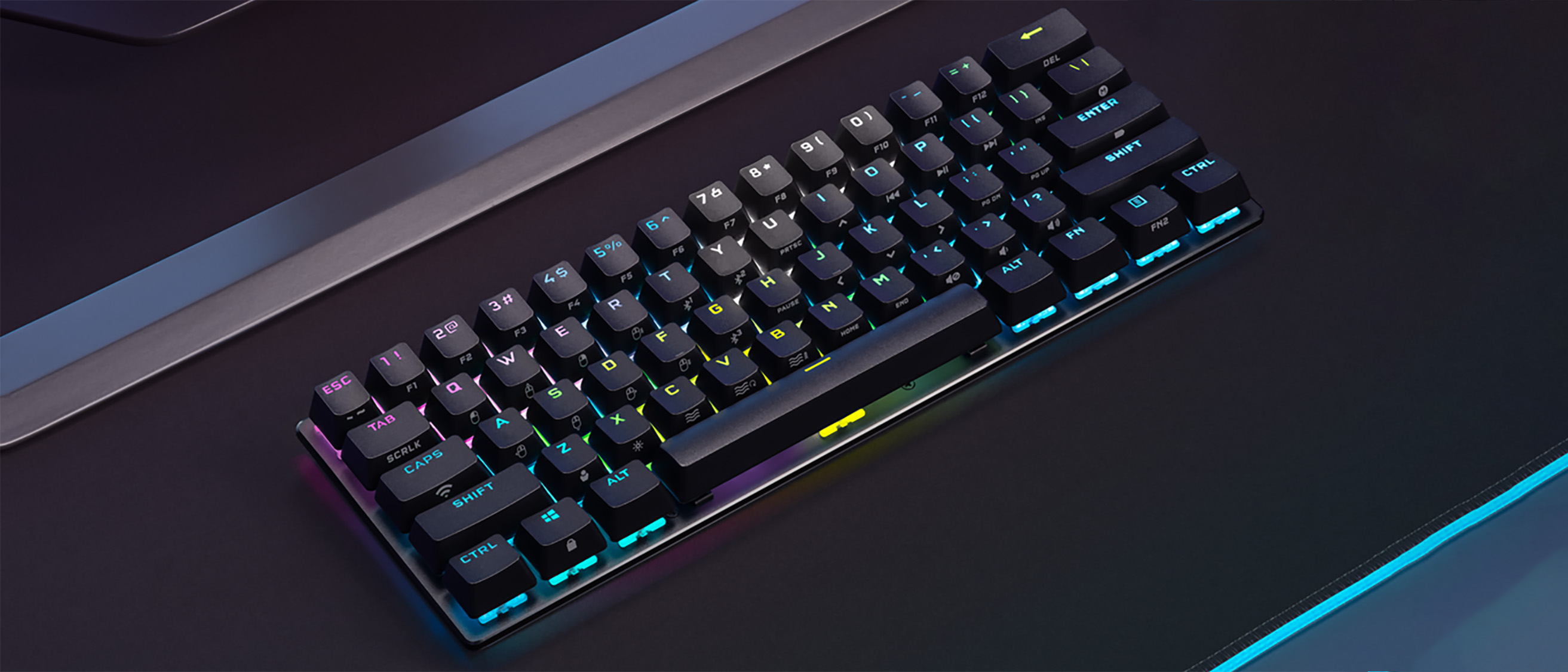 A Corsair K70 Pro Mini Wireless keyboard on a gaming mat