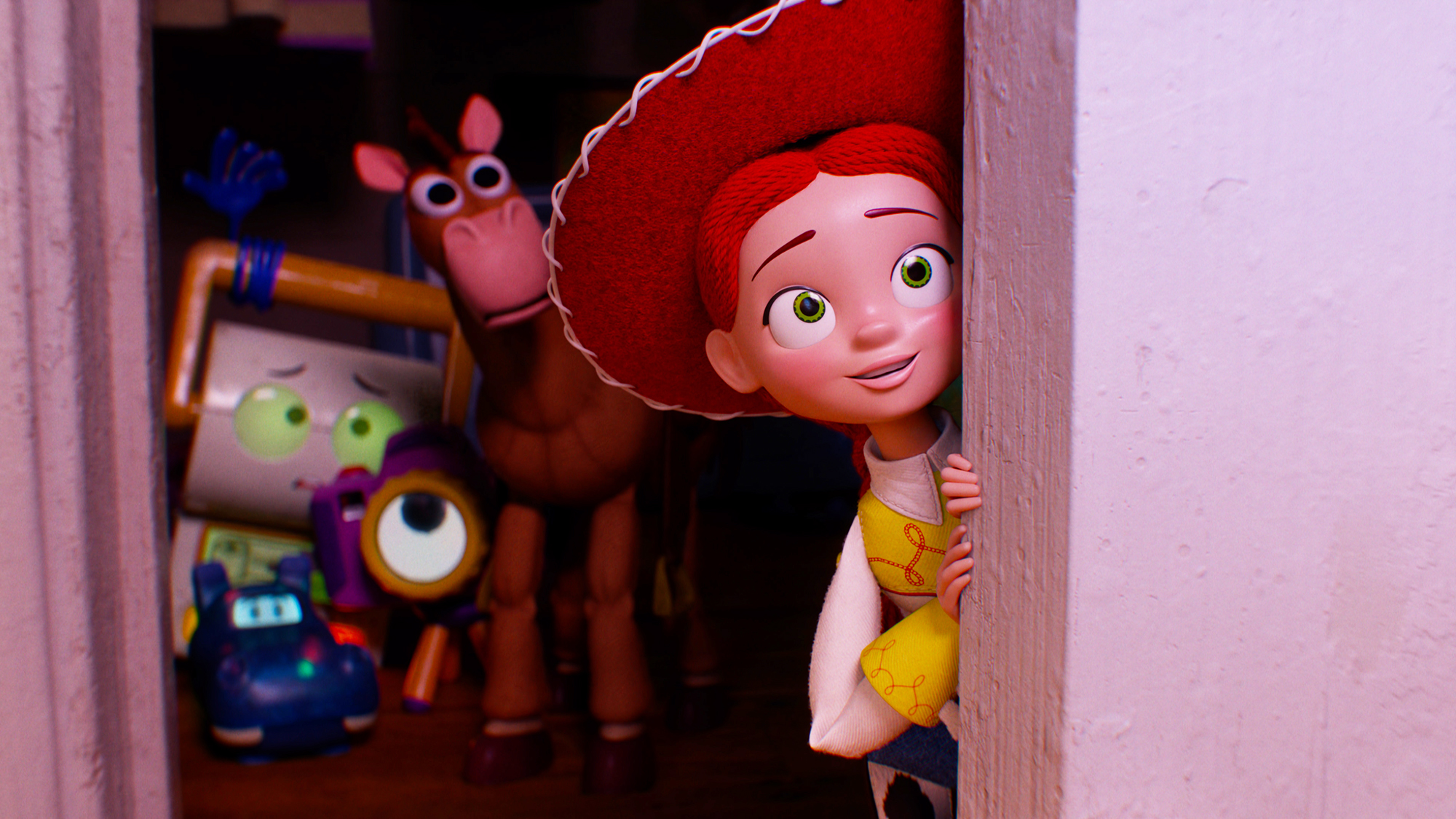 Jessie smiling as she peers from behind a door as Smarty Pants, Atlas, Snappy, and Bullseye watch on in Toy Story 5