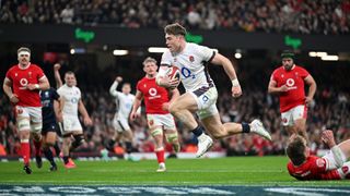 Tommy Freeman scoring a try during an England vs Wales Six Nations match
