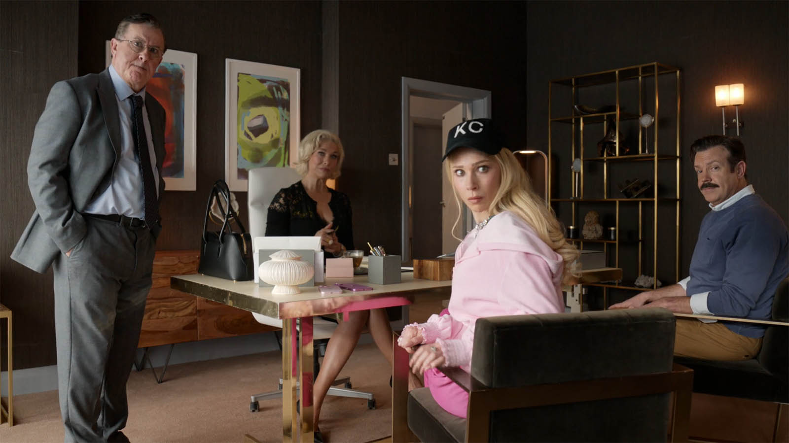 Higgins, Rebecca, Keeley, and Ted looking at someone off-camera in Ted Lasso season 4 episode 8