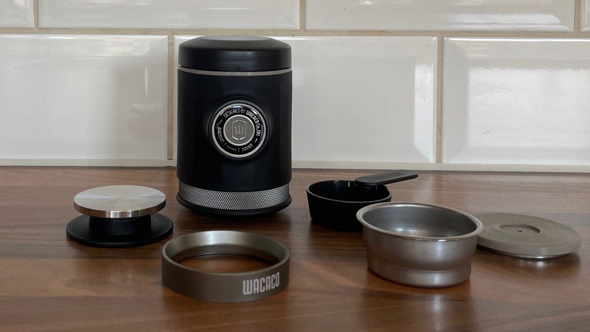 The Wacaco Picopresso an all its components on a kitchen work surface