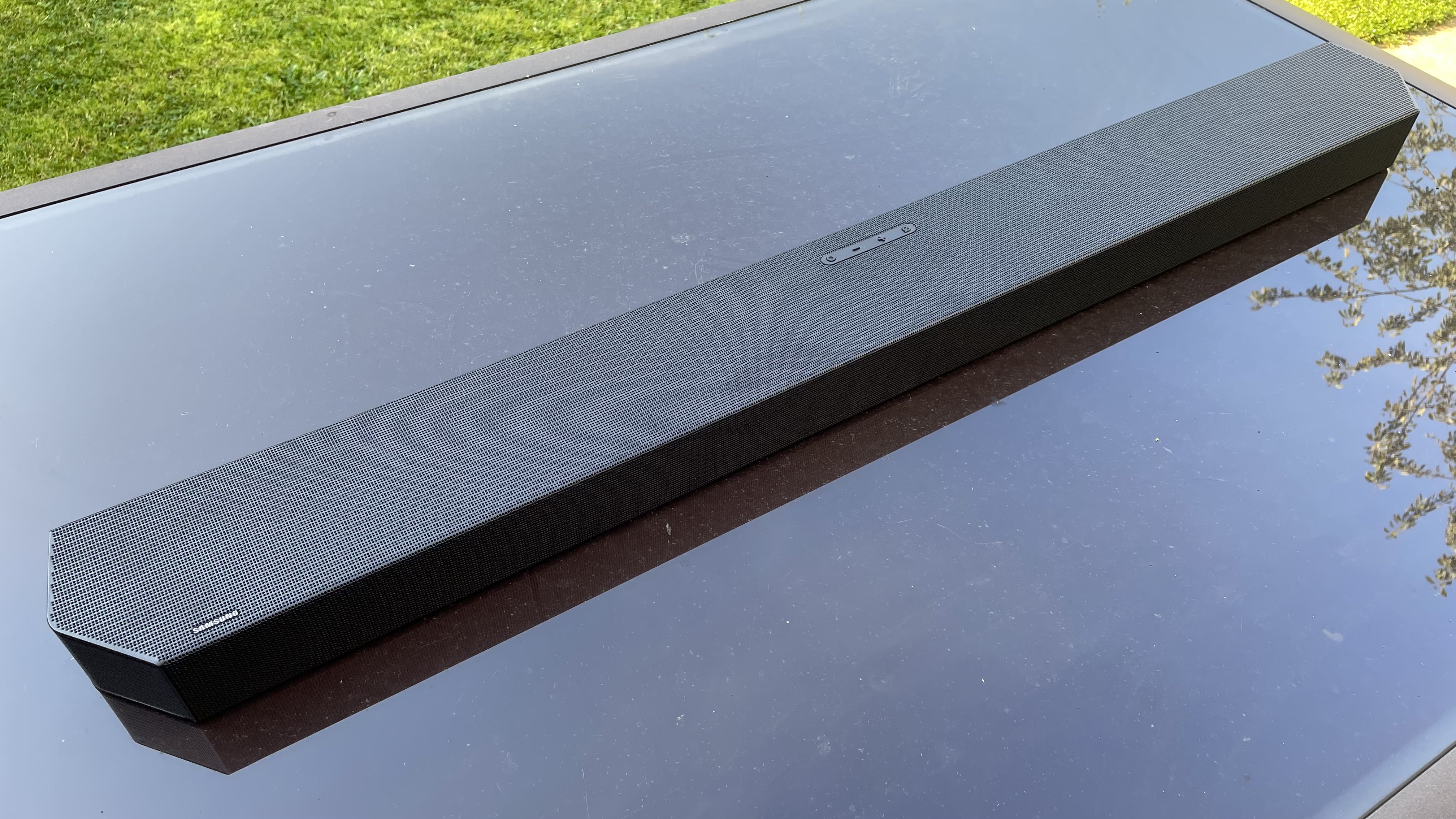 Samsung HW-Q800C soundbar unit sits alone on a black table