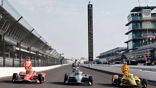 David Malukas, Alexander Rossi and Alex Palou sit on their cars for the front row photoshoot before the Indy 500 2026