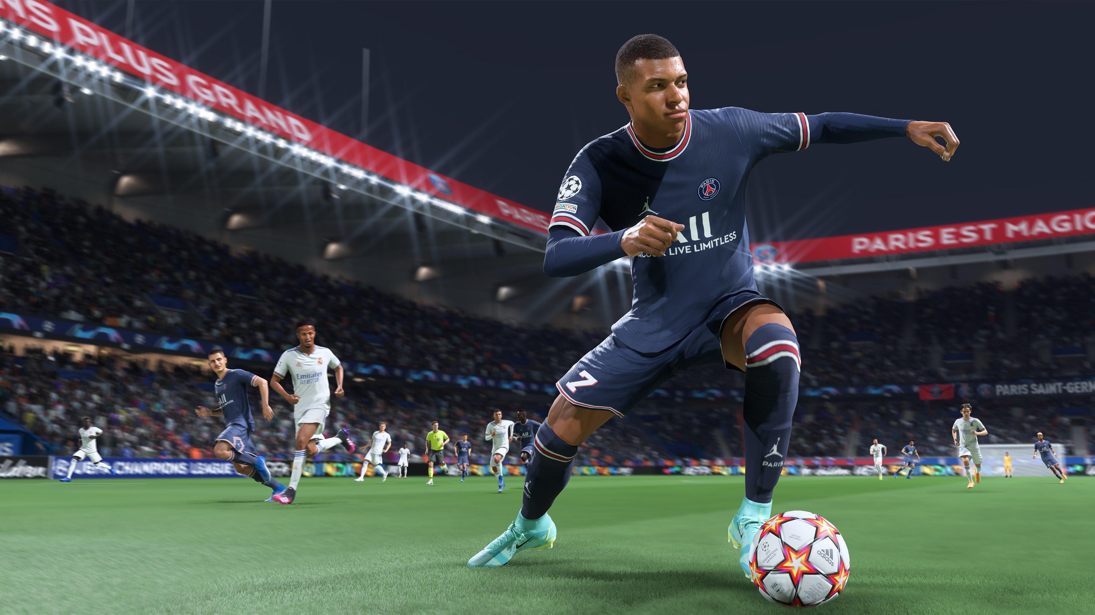 A footballer about to strike the ball during a match in FIFA 22 Career Mode.
