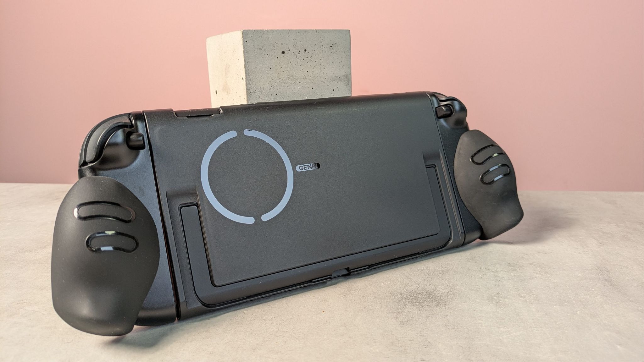 Back of Switch 2 with Genki Attack Vector cover and grips attached