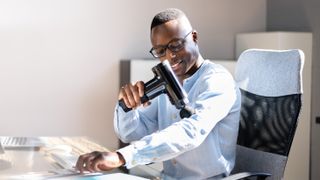 Massage gun user