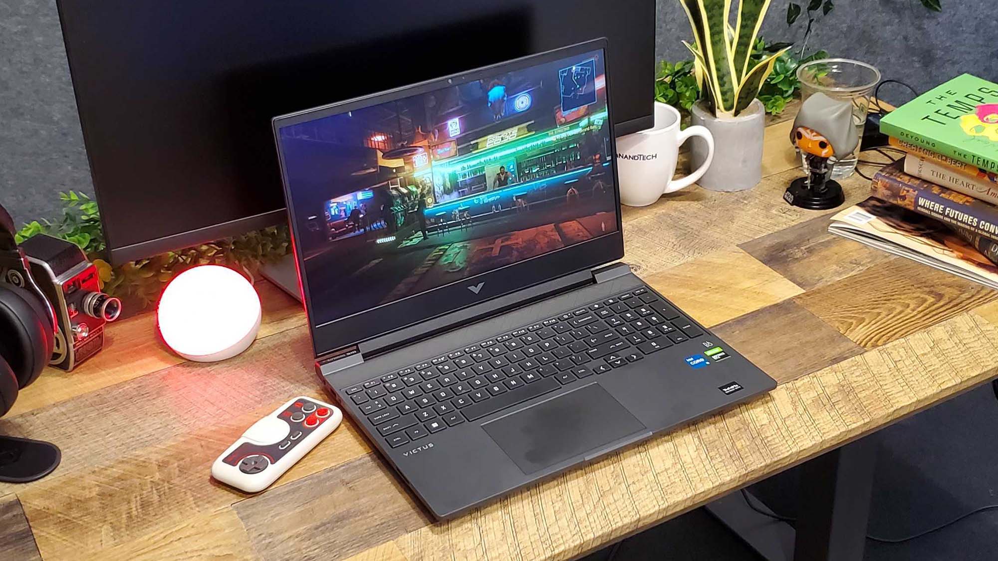 best 15-inch laptop HP Victus 15 sitting on a desk