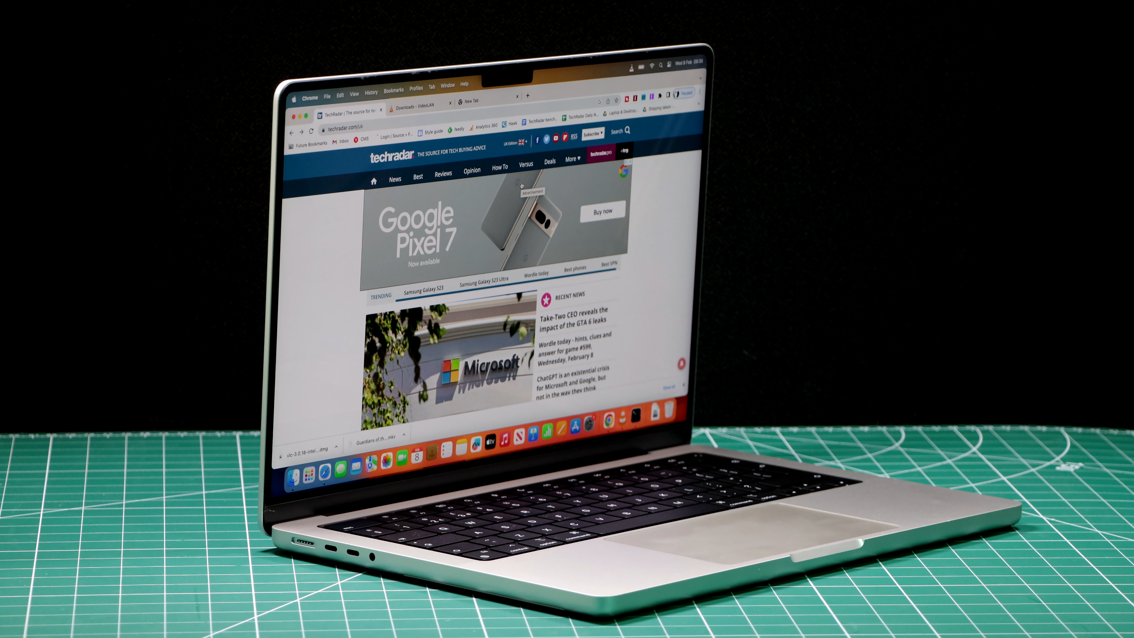 MacBook Pro 14-inch (2023) in a studio with screen showing website