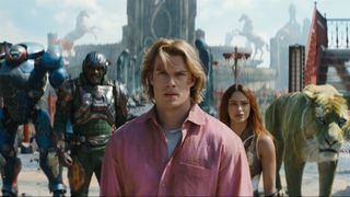 A close up of Adam/He-Man flanked by Roboto, Man at Arms, Teela, and Cringer in Amazon's 2026 movie adaptation of Masters of the Universe