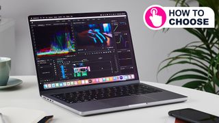 MacBook Pro 14-inch on a table in an office