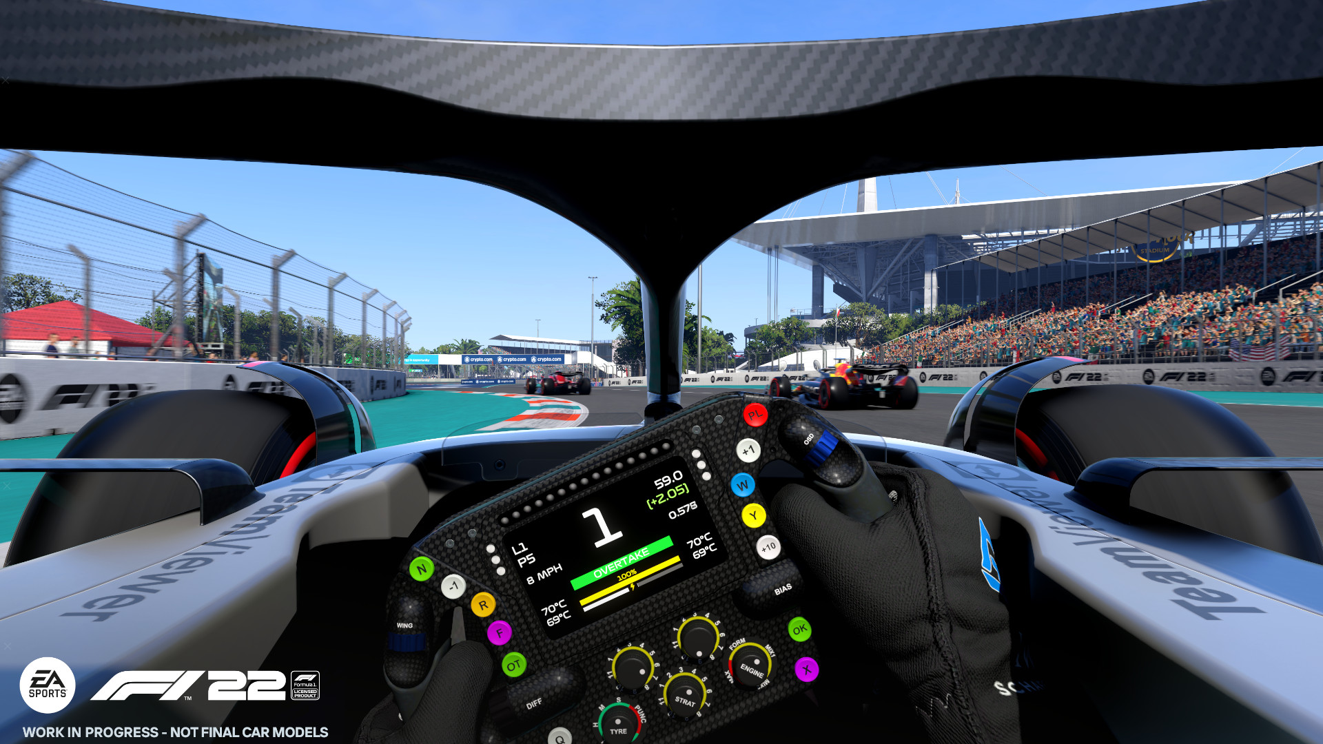 Formula One cars racing round the track in F1 22