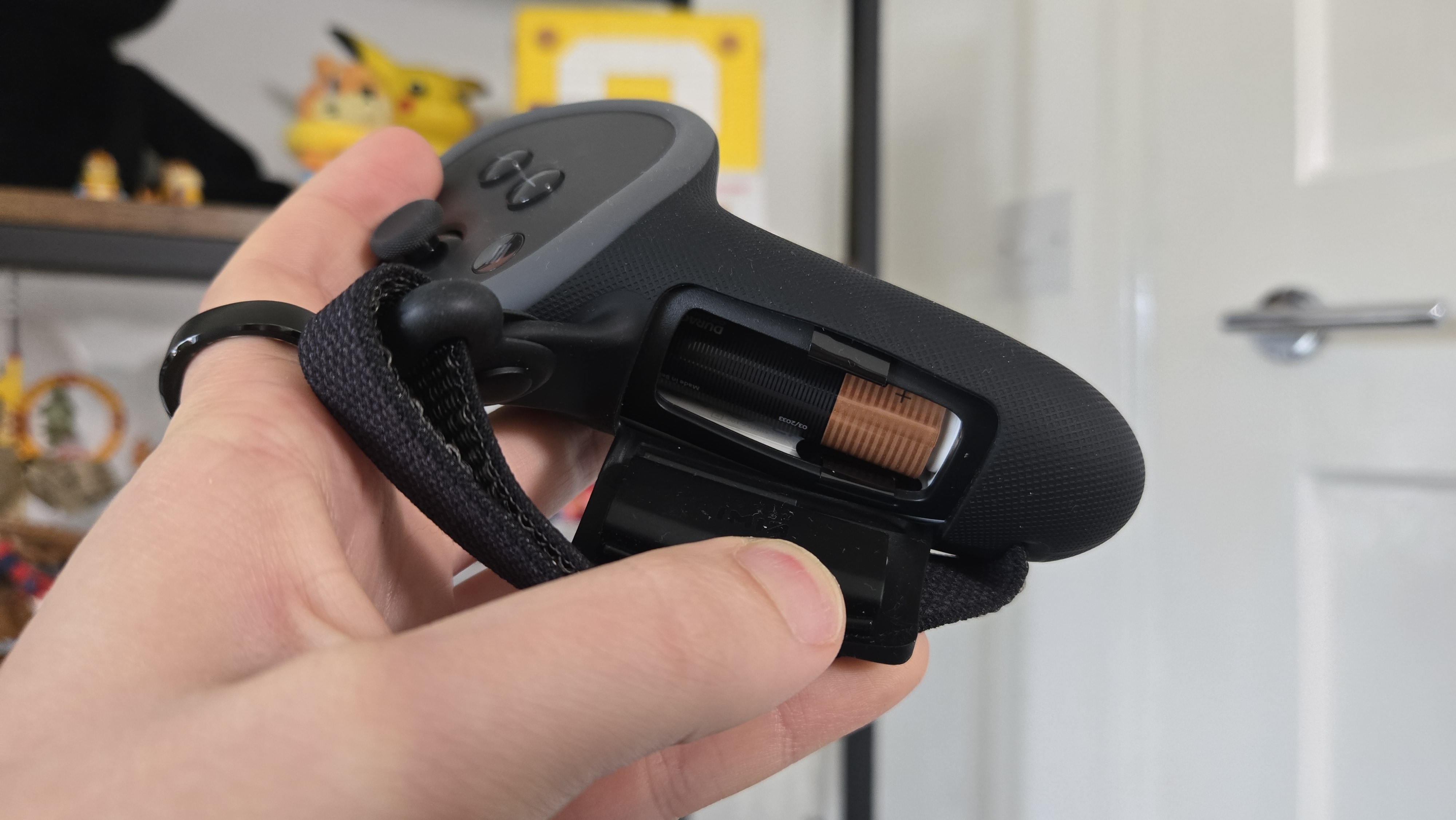 The Kiwi design G4 Pro Performance Controller Grips battery cover