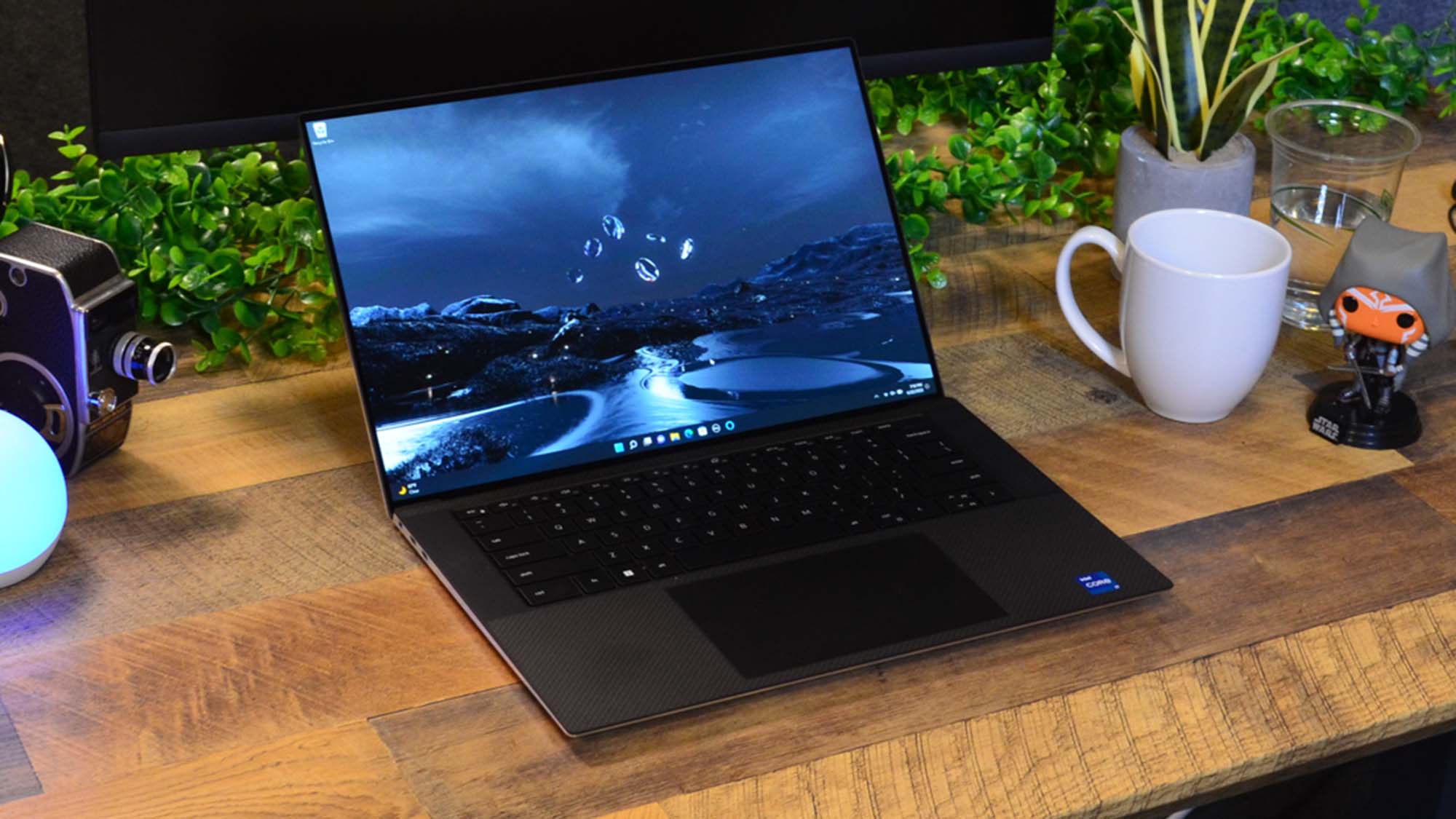 best 15-inch laptop Dell XPS 15 (2022) on a wooden desk