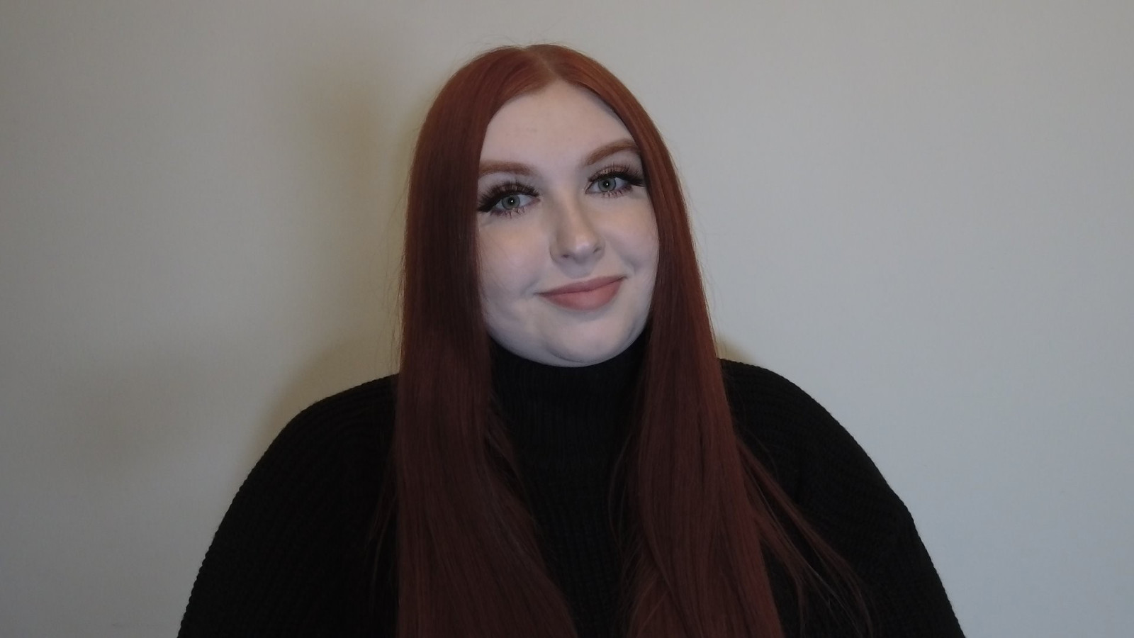 A still image of a woman taken on the Logitech Mevo Start