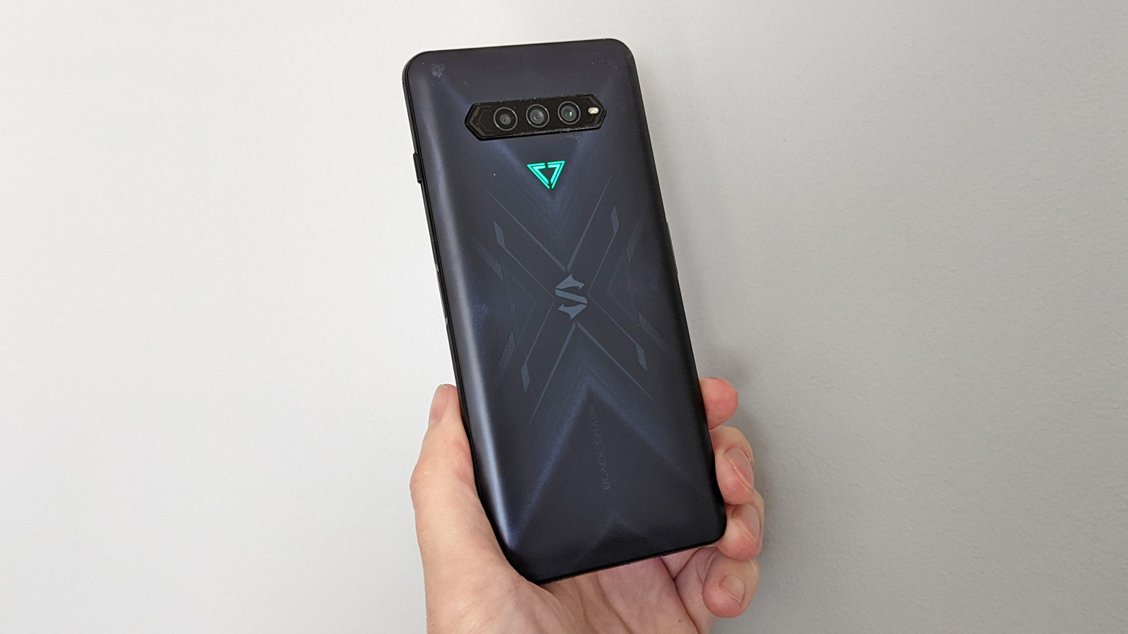 Xiaomi Black Shark 4 Pro being held in a hand, showing the back