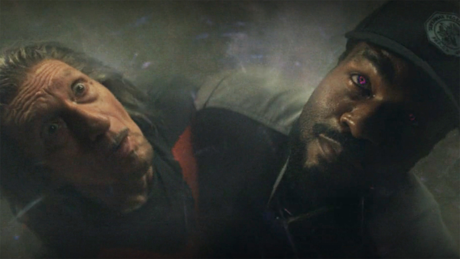 Trevor and Simon looking up as debris falls around them in Wonder Man episode 8