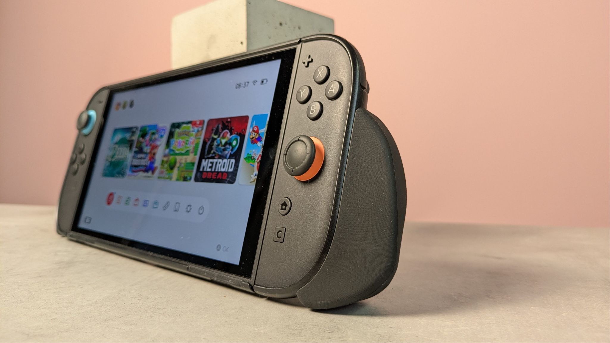 Close-up side view of Nintendo Switch 2 with Genki Attack Vector grip attached