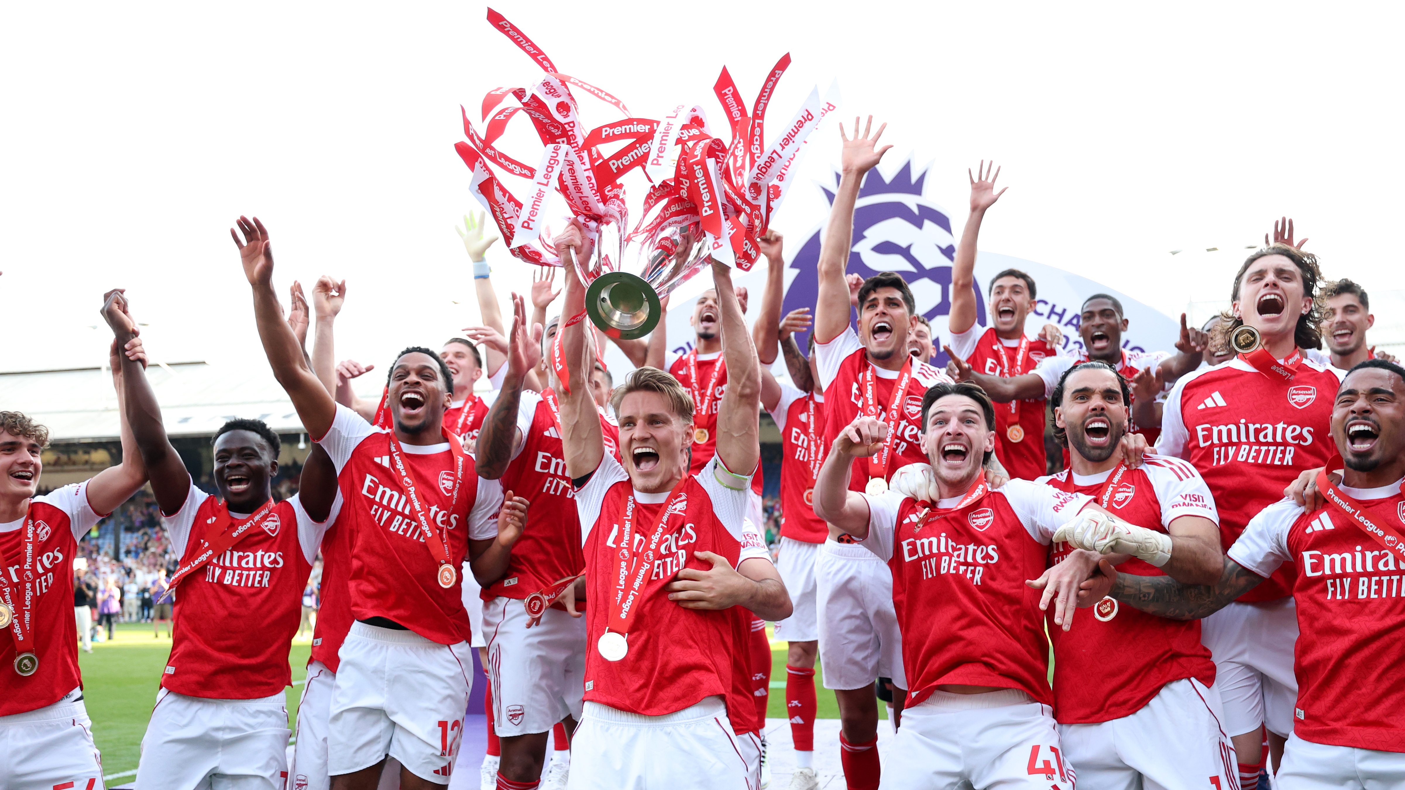 Martin Odegaard of Arsenal lifts the Premier League trophy as players of Arsenal celebrate being crowned 2025/26 Champions, after the match against Crystal Palace at Selhurst Park on May 24, 2026