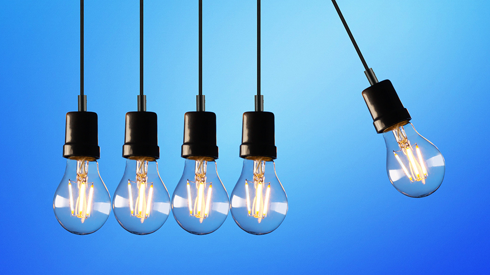 Image of Newton's cradle made with lightbulbs