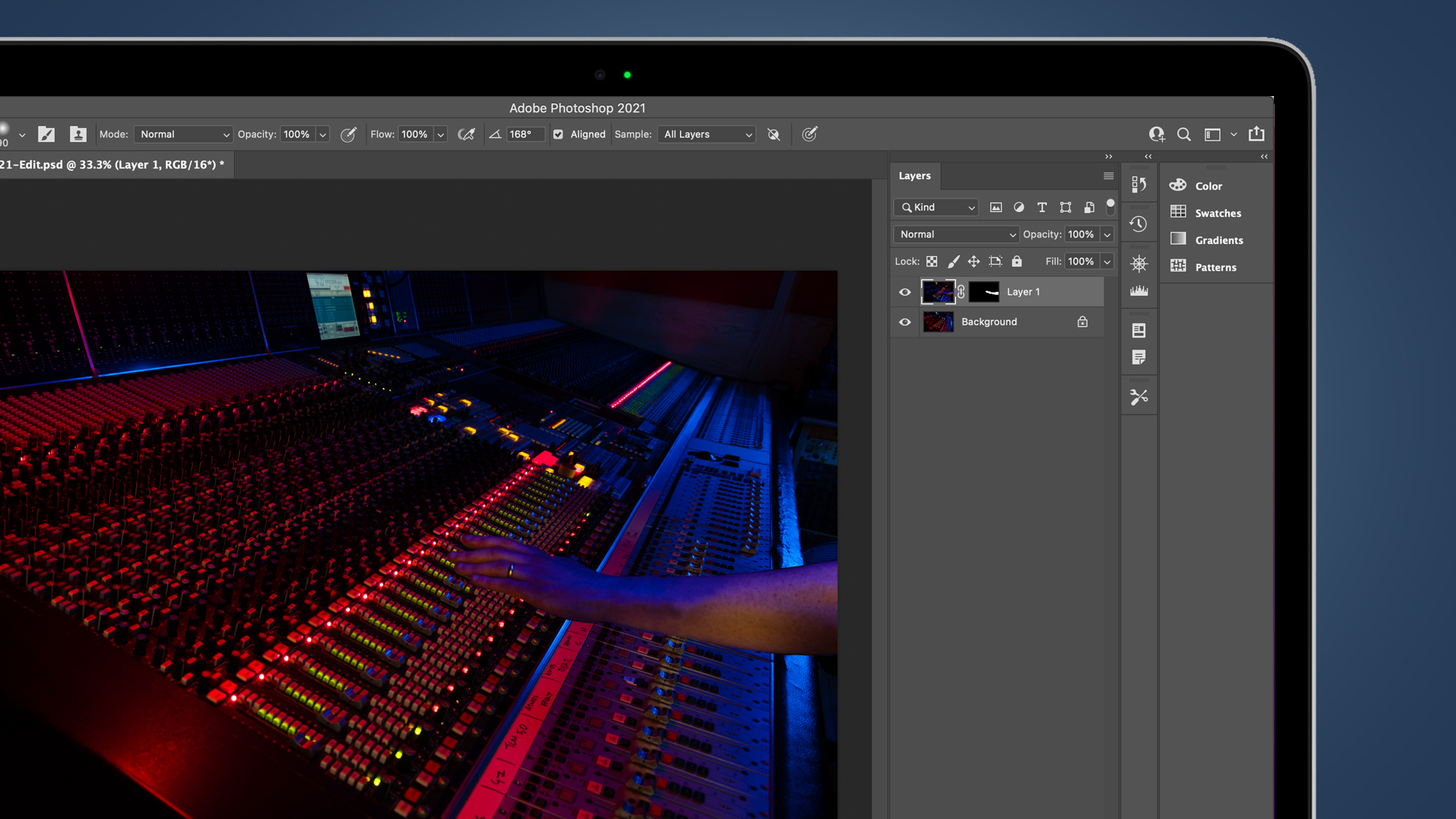 Laptop screen showing Photoshop layers