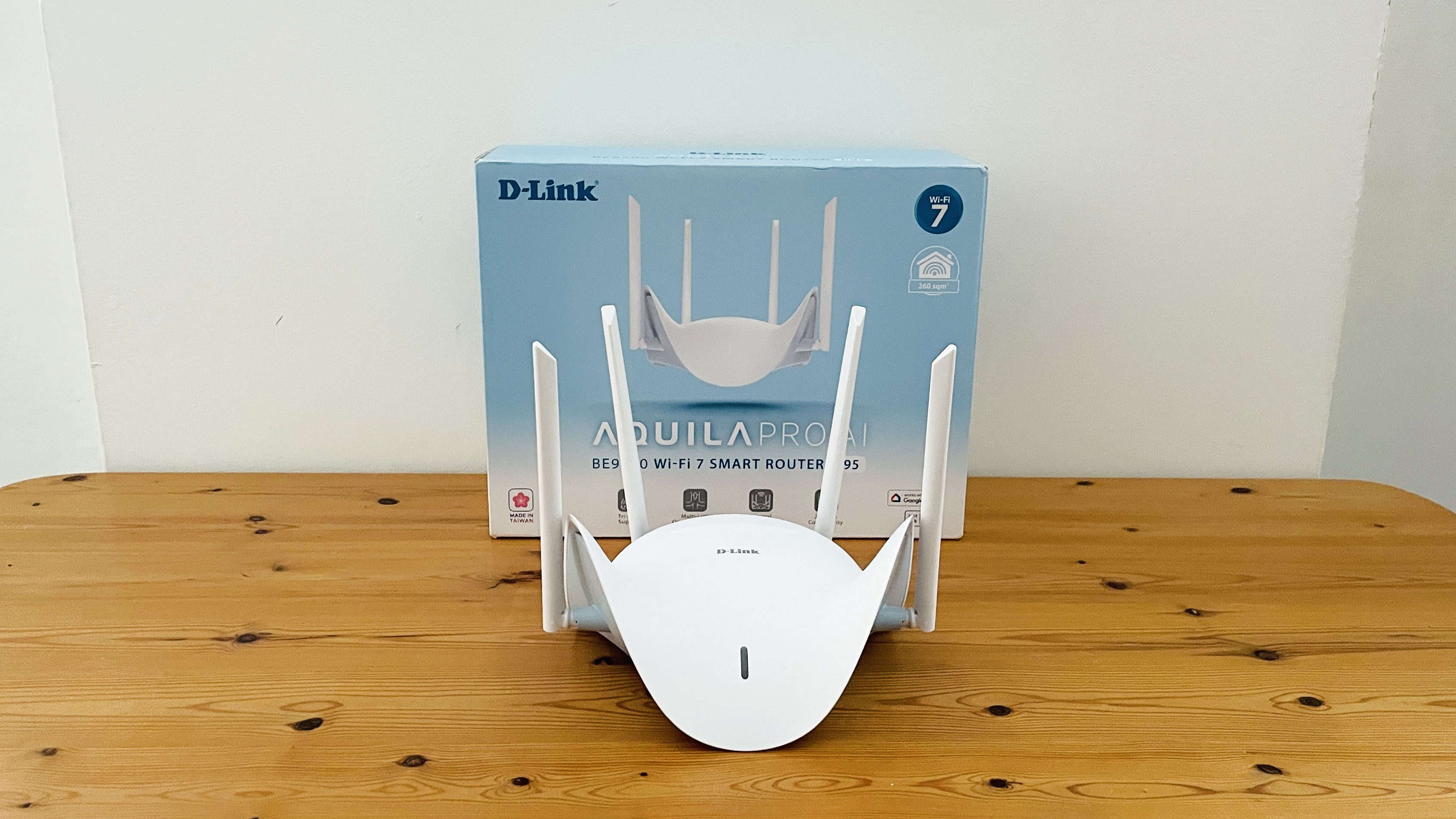 D-Link Aquila Pro AI R95 on wooden table