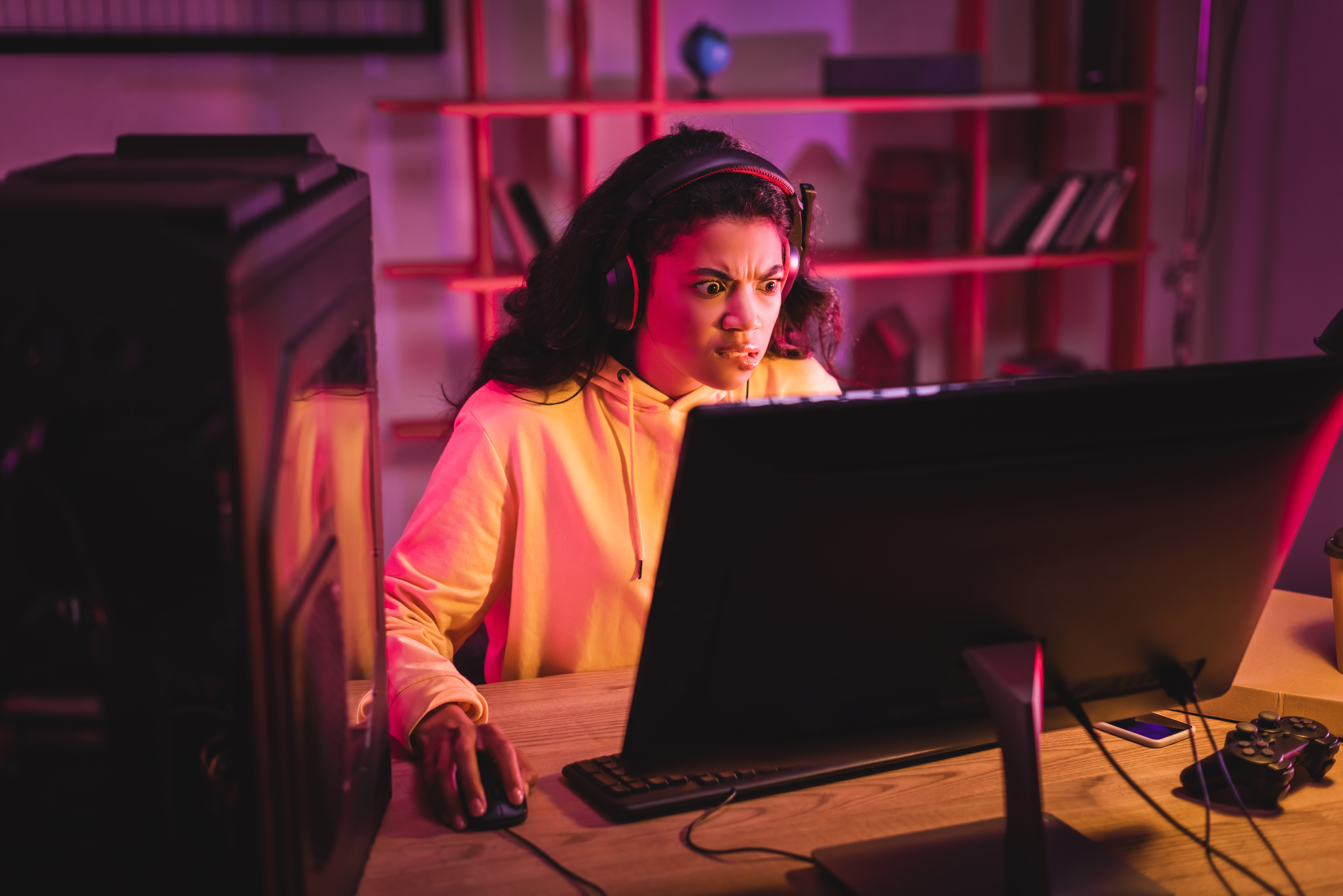 Confused PC gamer looking at monitor