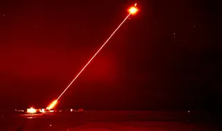 A DragonFire laser being test-fired in the Hebrides Range in Scotland