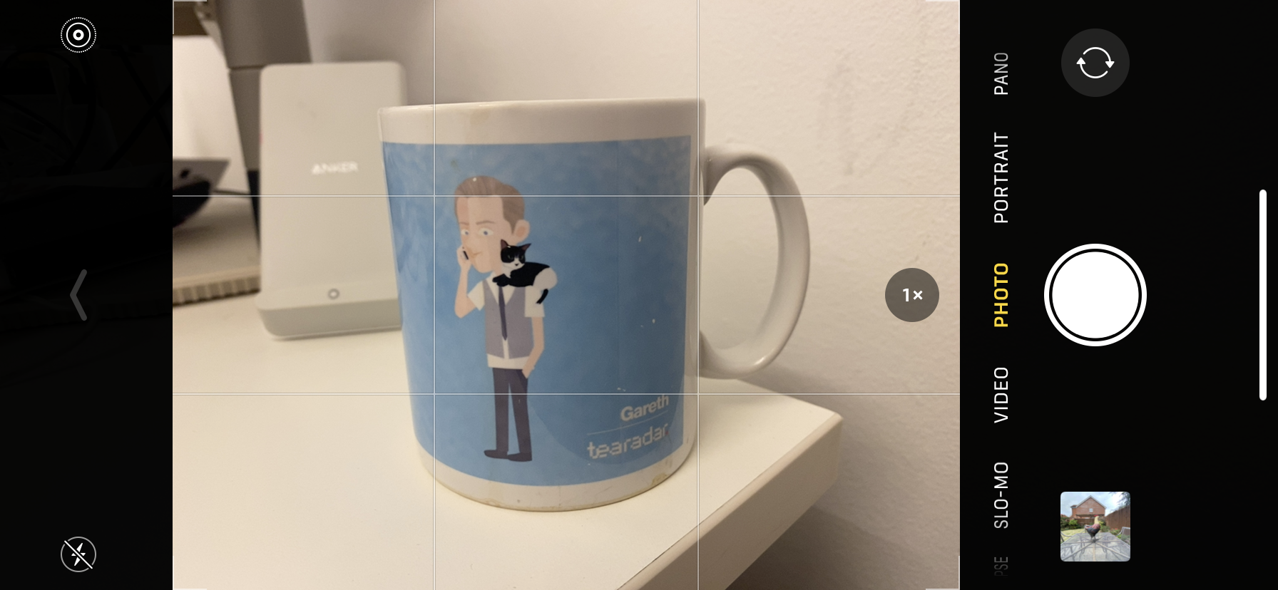 An image of the iPhone 11 viewfinder pointed at a mug
