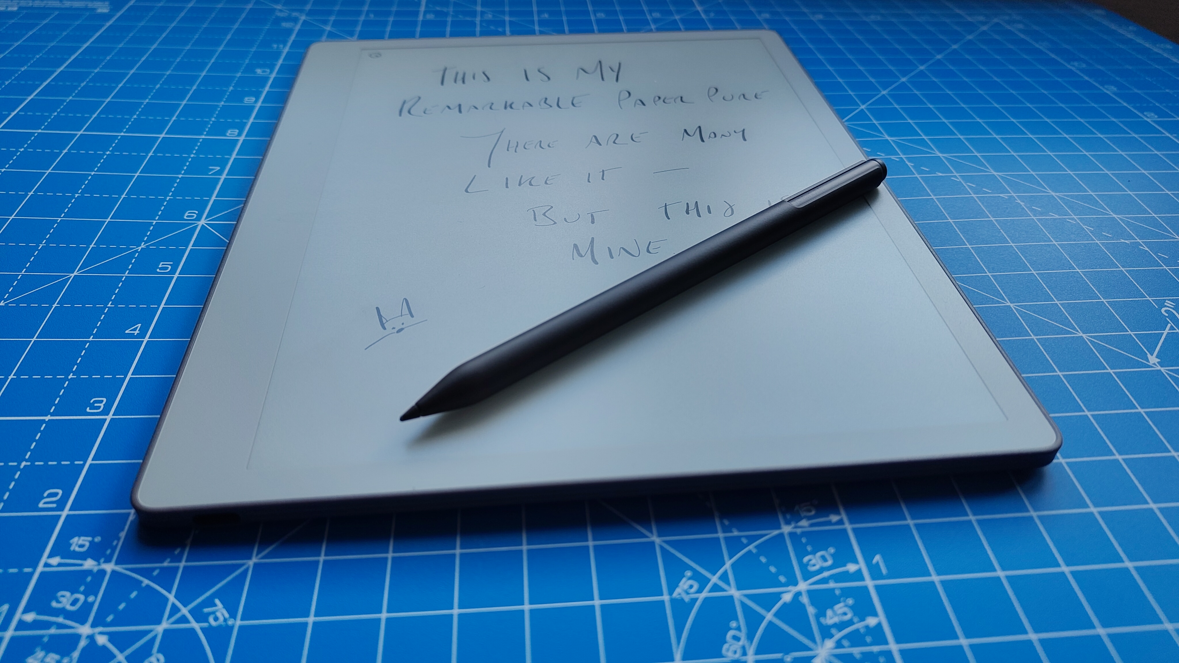 A reMarkable Paper Pure against a blue grid mat during our review process