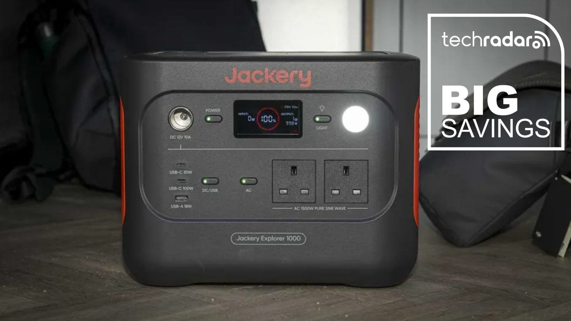 The Jackery Explorer 1000 V2 during our tests next to a white TechRadar badge that reads 'Big Savings'