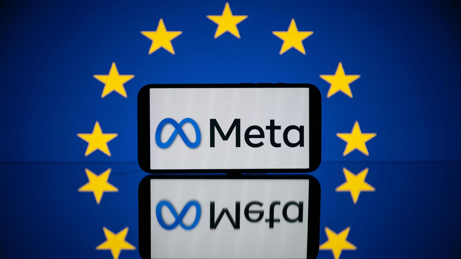 This picture taken on April 27, 2023 in Toulouse, southwestern France, shows a screen displaying the Meta logo and the European flag.