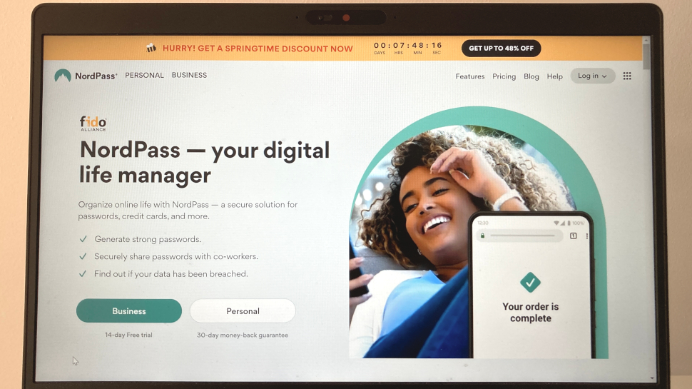 Photo of NordPass website on a Windows laptop