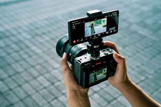 Smartphone attached to Sony cine camera and displaying Sony Monitor & Control app