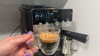 Ninja Luxe Caf&eacute; Mini with a cup of espresso