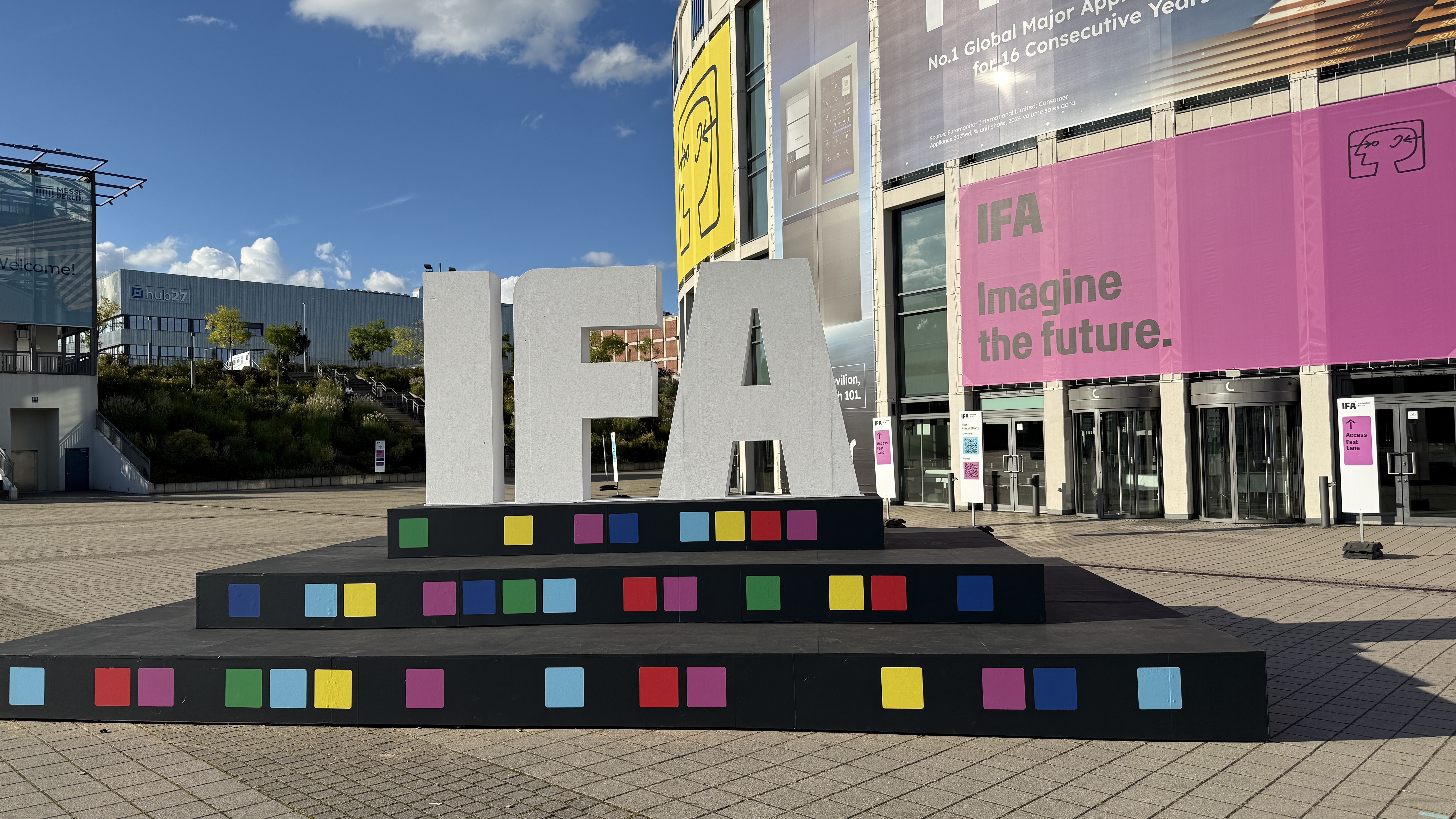 A sign of the IFA logo, with the Messe Berlin complex in the background