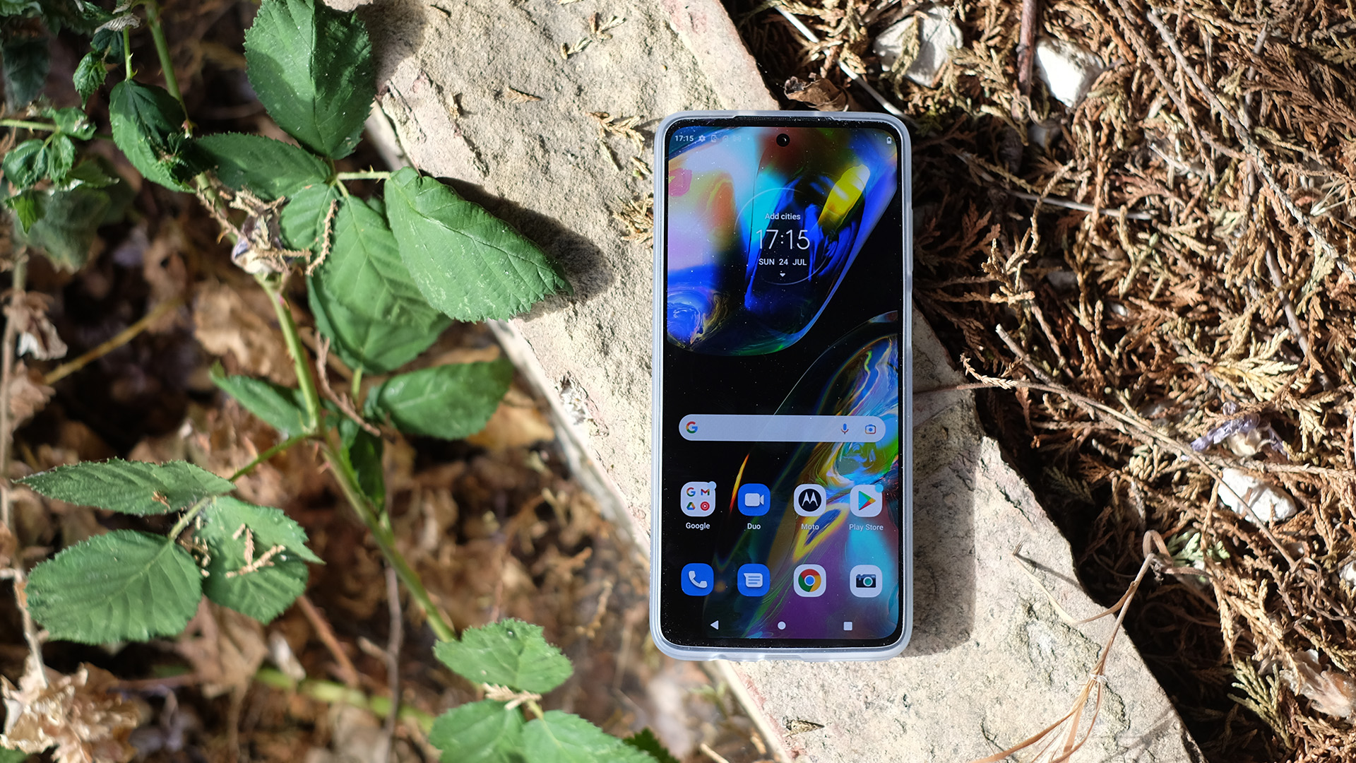 Motorola Moto G82 on a brick wall screen straight