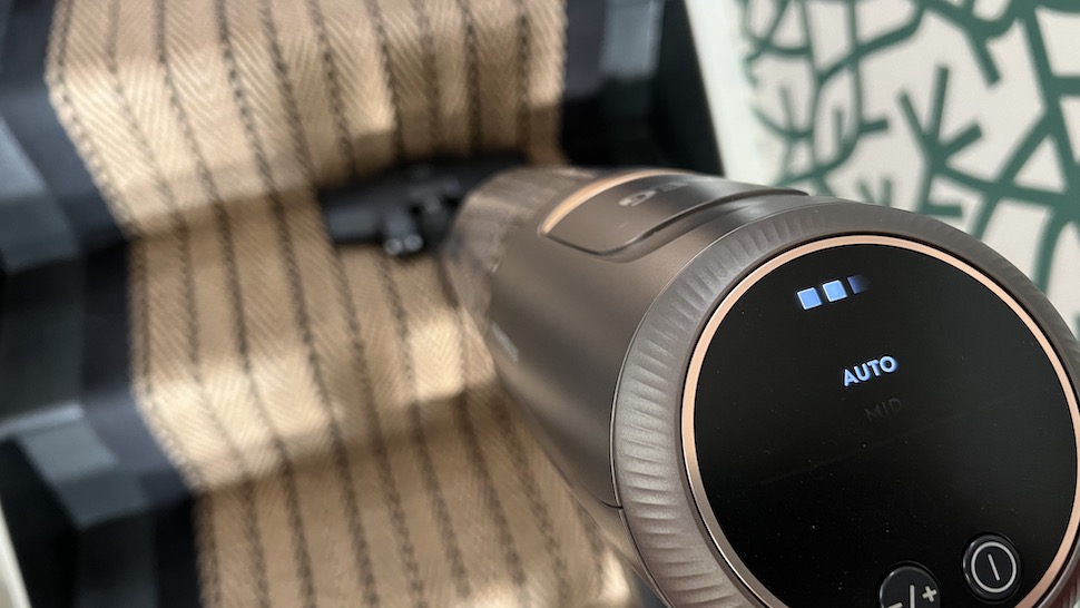 AEG Ultimate 8000 cordless vacuum being tested on stairs
