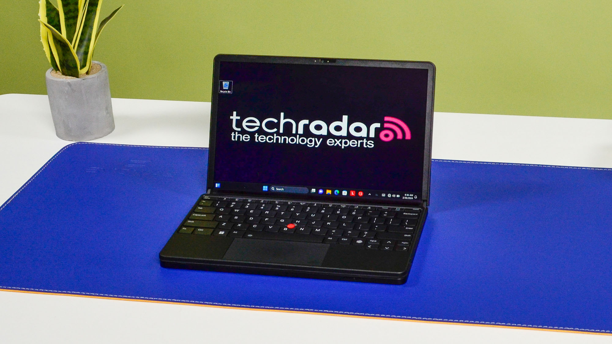 A Lenovo ThinkPad X1 Fold 16 Gen 1 on a white desk