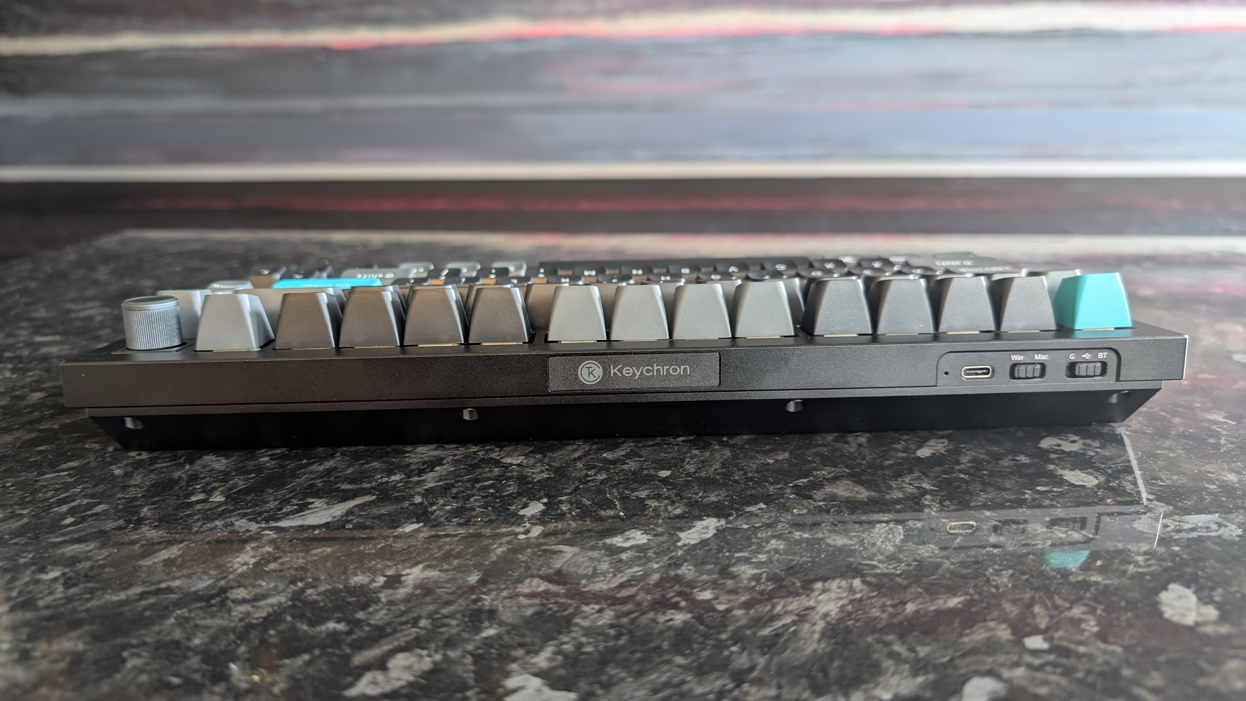 The Keychron Q1 Ultra 8K, photographed on a dark marble worktop.
