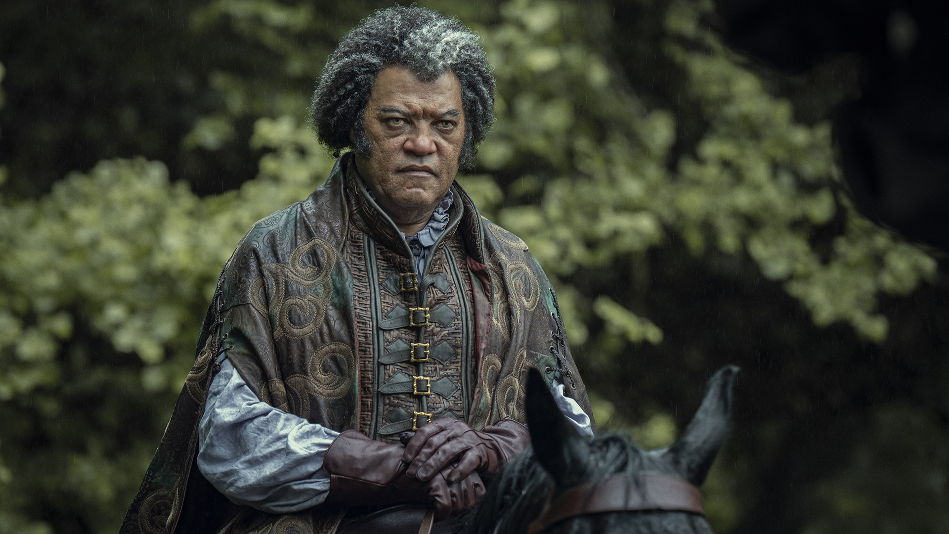 Regis sitting on a horse in The Witcher season 4