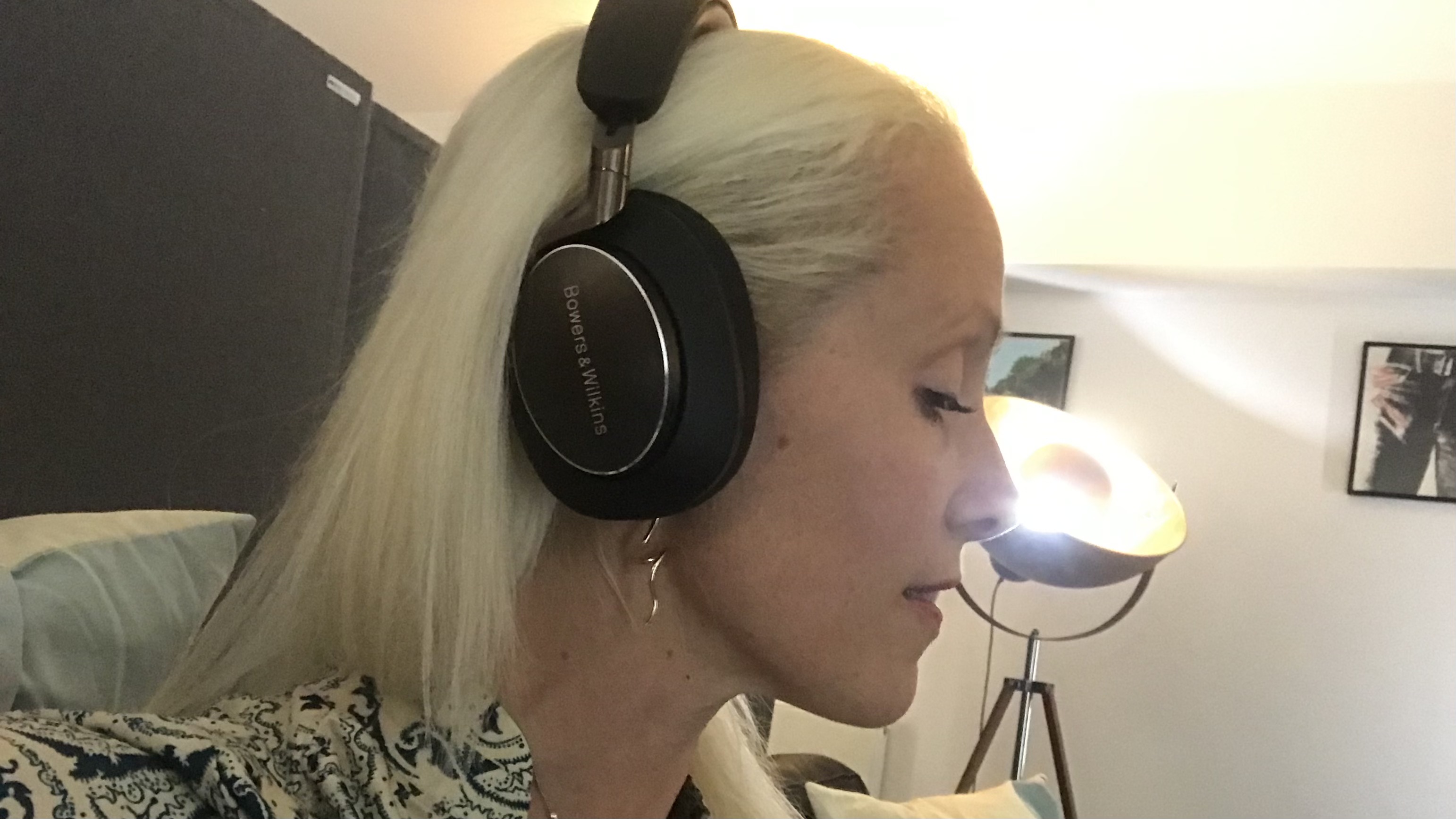 Bowers &amp;amp; Wilkins PX8 worn by TechRadar's Becky Scarrott, on beige background