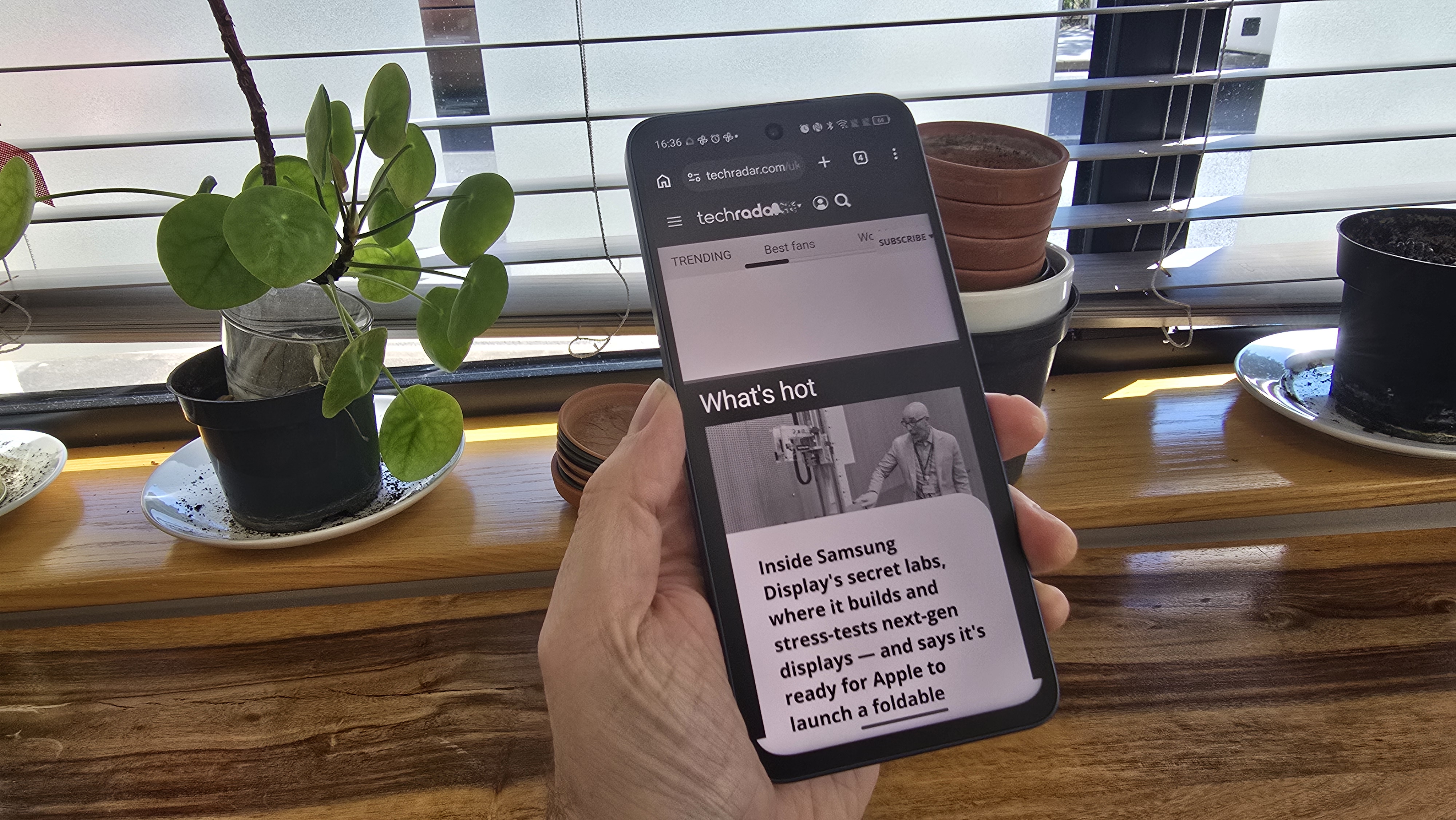 TCL NXTPAPER 70 Pro smartphone in an office and outdoors