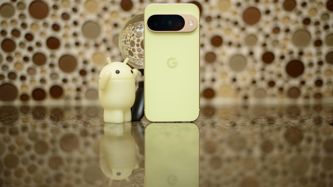 Google Pixel 10 in Lemongrass against a bubbly backsplash