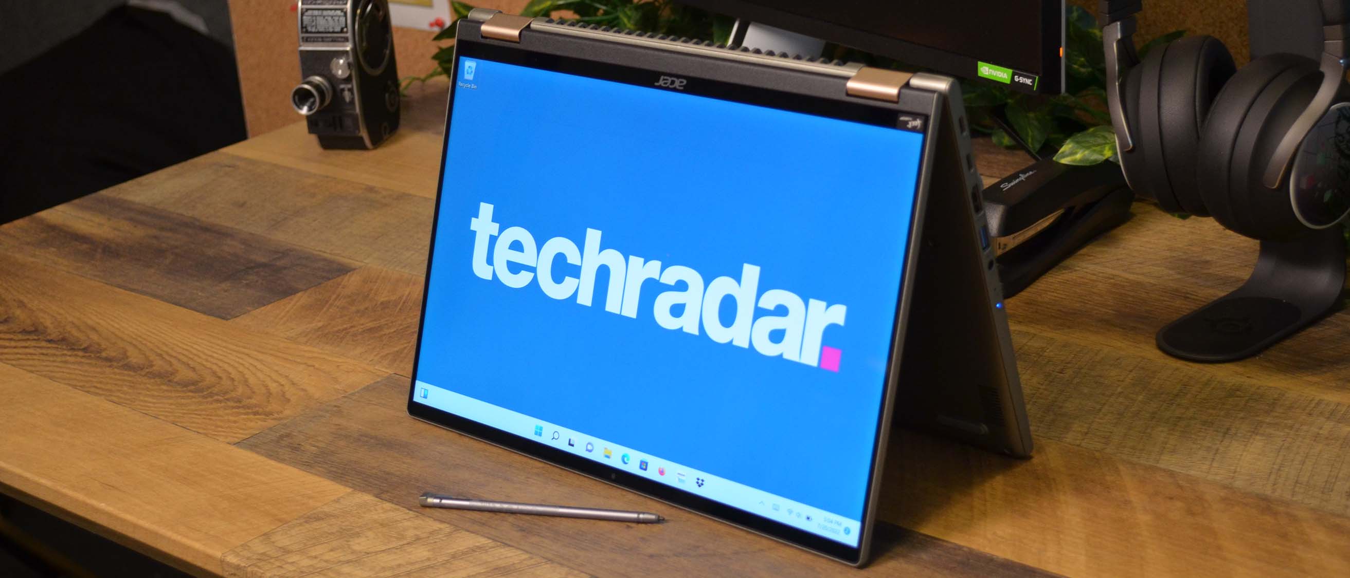 An Acer Spin 5 (2022) on a wooden deskl