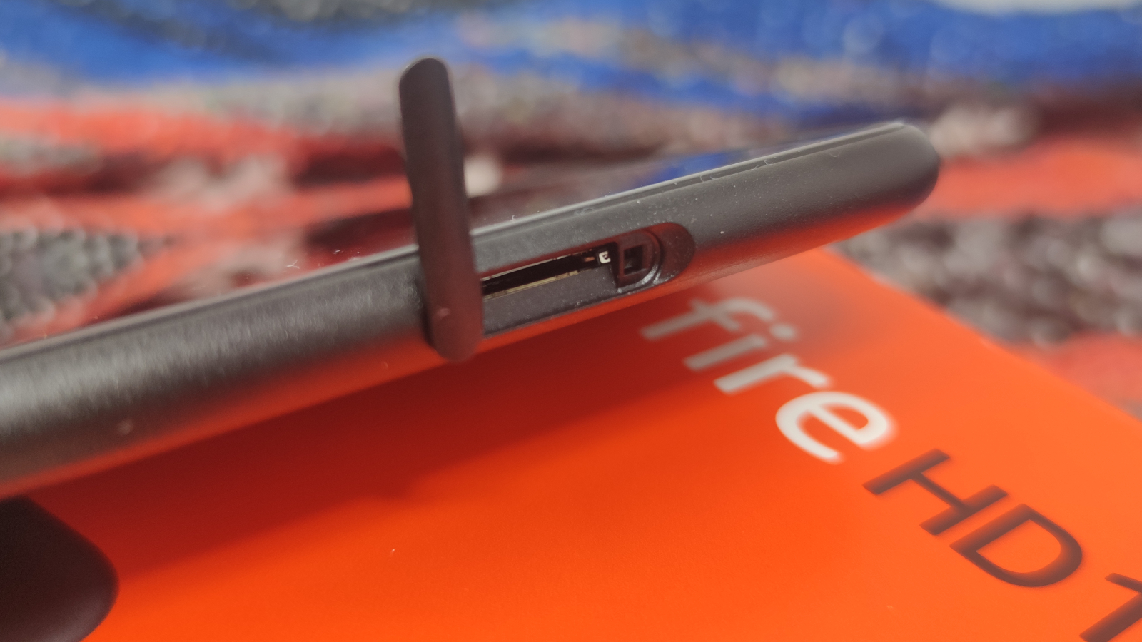 The Amazon Fire HD 10 (2023) on a colored background.