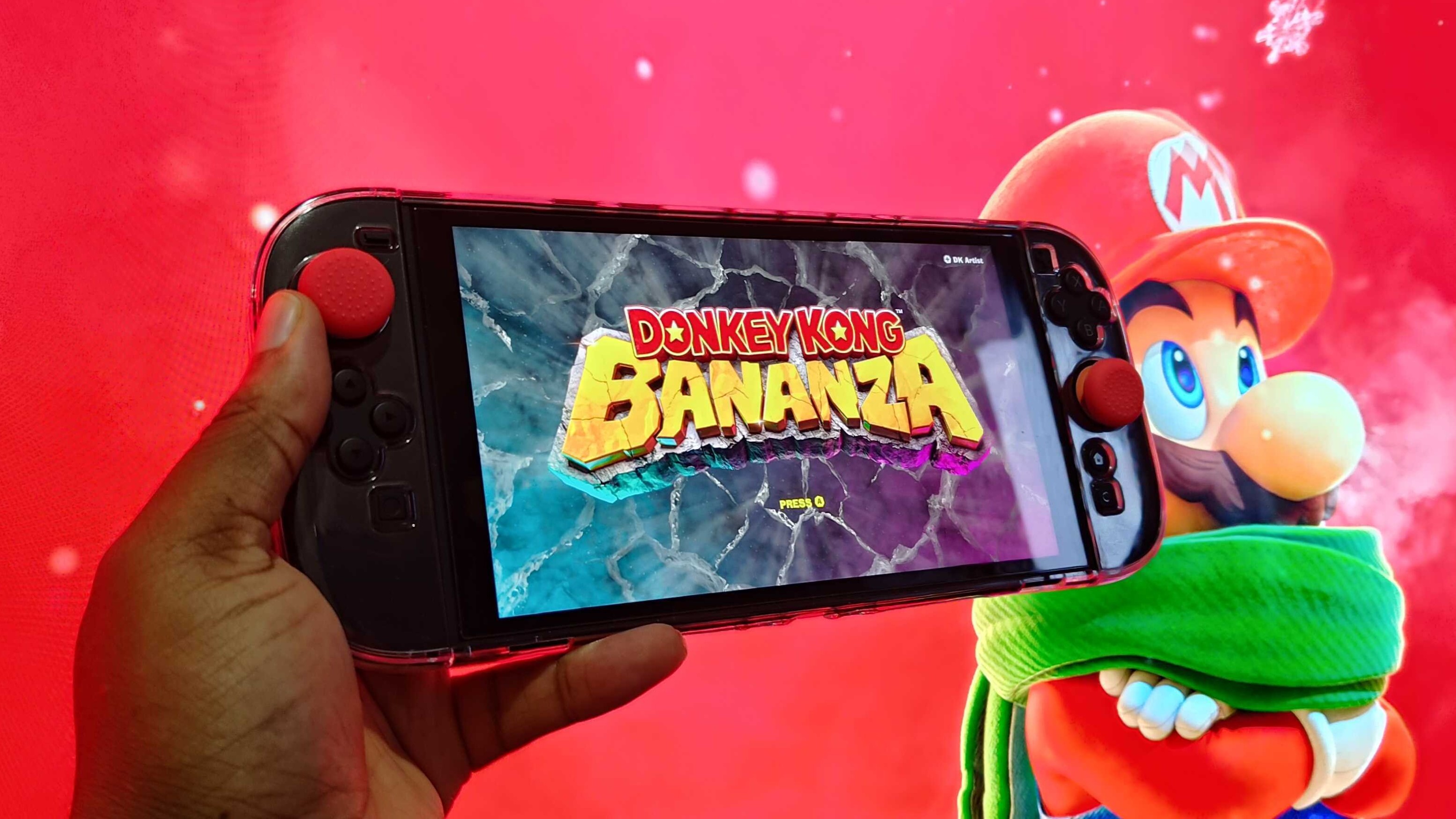 A man holding the Switch 2 device