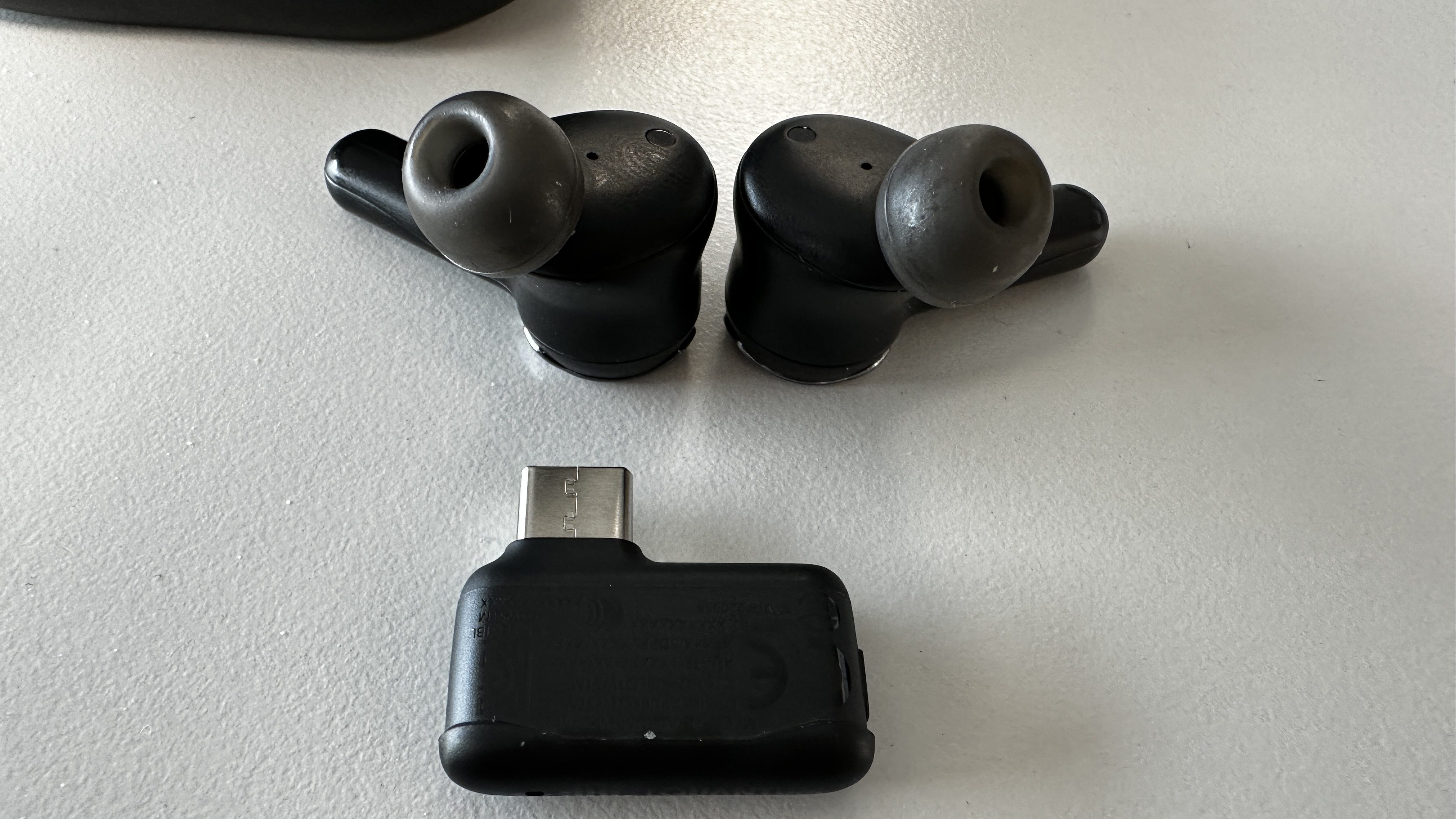 JBL Quantum TWS earbuds with USB-C adapter