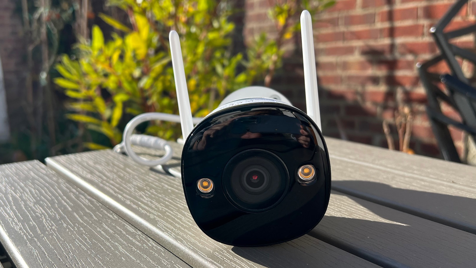 The Imou Bullet 2 on a garden table